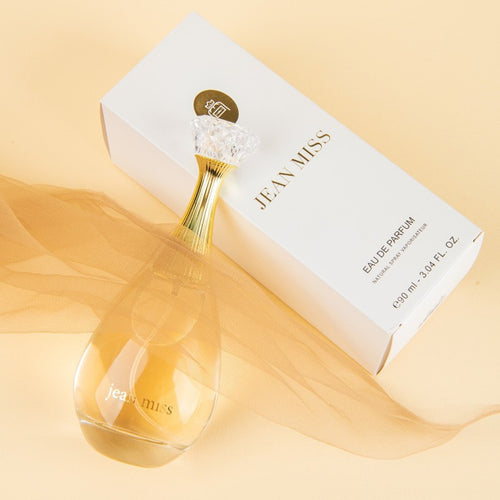 JEAN MISS True Me eau de parfum 90 ml — bottle and carton on gold styling